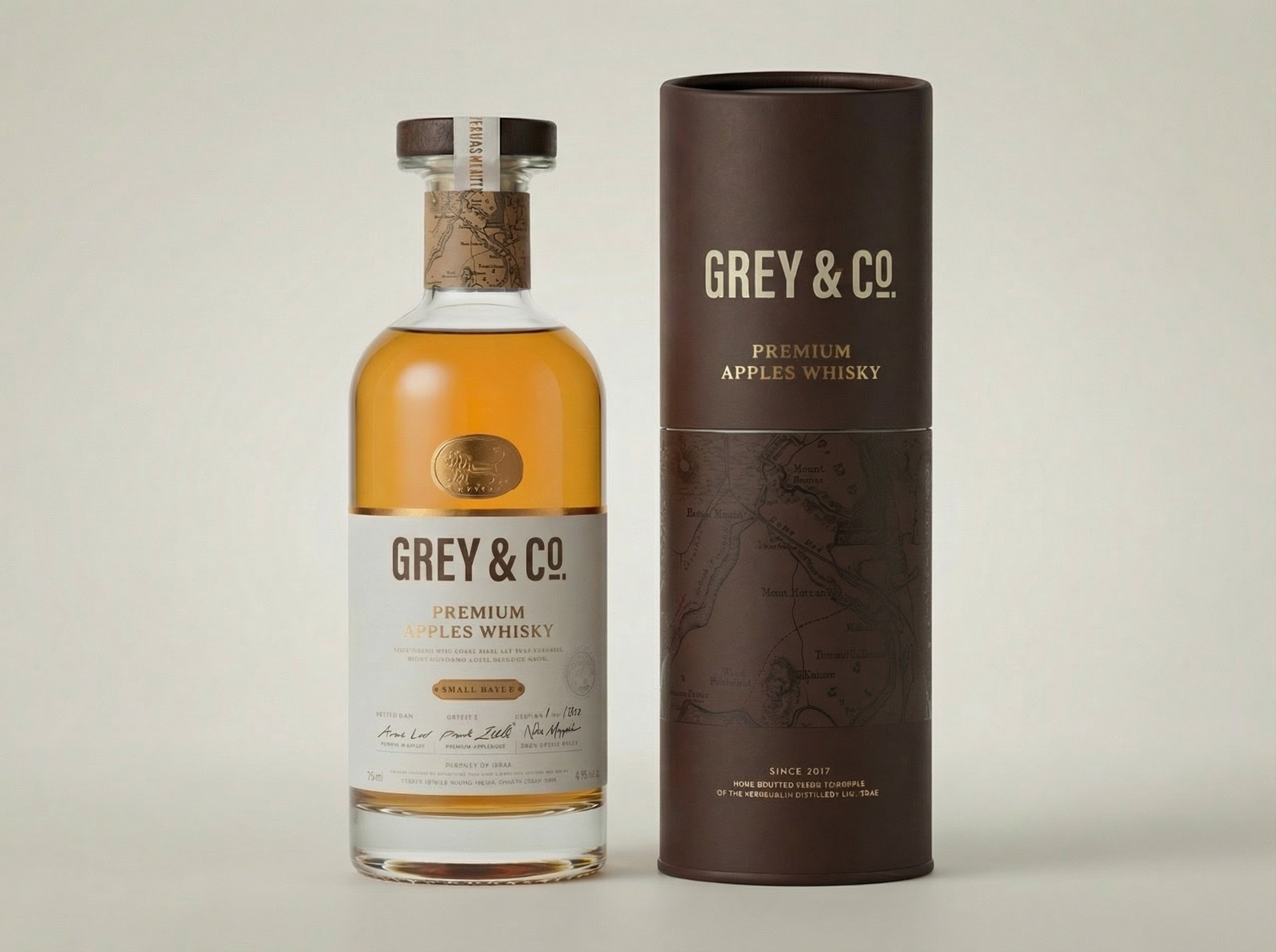 Grey & Co. premium whisky bottle with branded paper tube